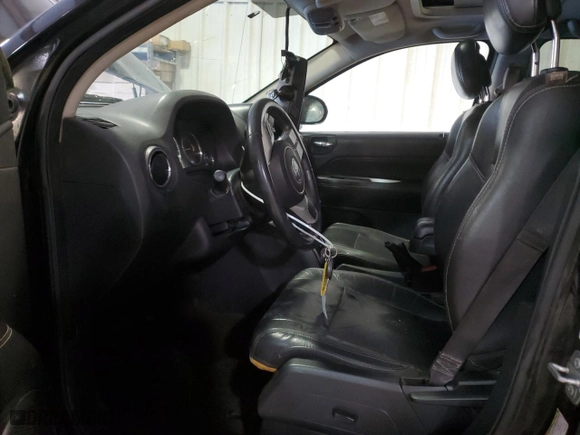 2016 Jeep Compass High Altitude Edition with VIN 1C4NJCEA1GD678698, listed as a Copart auction lot 83594524 with 206,095 mi miles and Salvage Title. Bid and sale history available at carsss.com. Image 7.