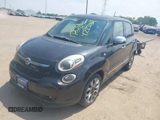 2014 FIAT 500L Lounge with VIN ZFBCFACH1EZ003031, listed as a IAAI auction lot 42232861 with 104,496 mi miles and . Bid and sale history available at DreamBid. Image 2.