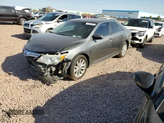 2012 Toyota Camry XLE z VIN 4T1BD1FK8CU048172, wystawiony jako Copart lot #51941205 z przebiegiem 186 001 mil mil oraz Szkoda całkowita • Salvage title. Historia ofert i sprzedaży dostępna na DreamBid. Obrazek 1.