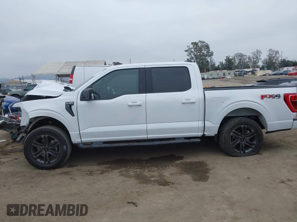 2022 Ford F-150 XL with VIN 1FTFW1E57NKE14424, listed as a IAAI auction lot 42097712 with 56,879 mi miles and . Bid and sale history available at DreamBid. Image 14.
