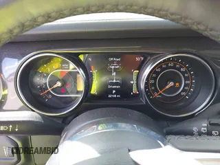 2023 Jeep Wrangler Sahara with VIN 1C4HJXEG4PW584800, listed as a IAAI auction lot 41908392 with 22,108 mi miles and . Bid and sale history available at DreamBid. Image 7.
