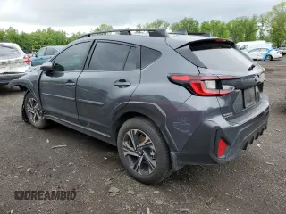 2024 Subaru Crosstrek Premium z VIN JF2GUADC8R8375325, wystawiony jako Copart lot #57247975 z przebiegiem 28 764 mil mil oraz Szkoda całkowita • Salvage title. Historia ofert i sprzedaży dostępna na DreamBid. Obrazek 2.