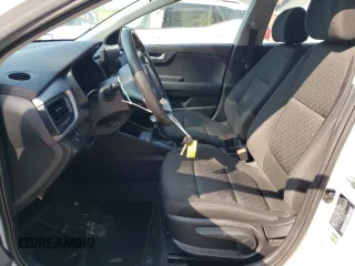 2023 Kia Rio S with VIN 3KPA24AD3PE597752, listed as a Copart auction lot 64836674 with 8,434 mi miles and Salvage Title. Bid and sale history available at carsss.com. Image 7.
