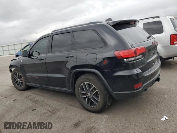 2017 Jeep Grand Cherokee Trailhawk with VIN 1C4RJFLT5HC692439, listed as a Copart auction lot 81093534 with 135,493 mi miles and Salvage title. Bid and sale history available at DreamBid. Image 2.