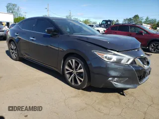 2017 Nissan Maxima SL with VIN 1N4AA6AP9HC434613, listed as a Copart auction lot 57560025 with 99,433 mi miles and Salvage title. Bid and sale history available at DreamBid. Image 4.