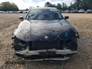 2018 BMW 7 Series 740i xDrive with VIN WBA7E4C5XJGV24003, listed as a Copart auction lot 71395443 with 63,558 mi miles. Bid and sale history available at carsss.com. Image 5.