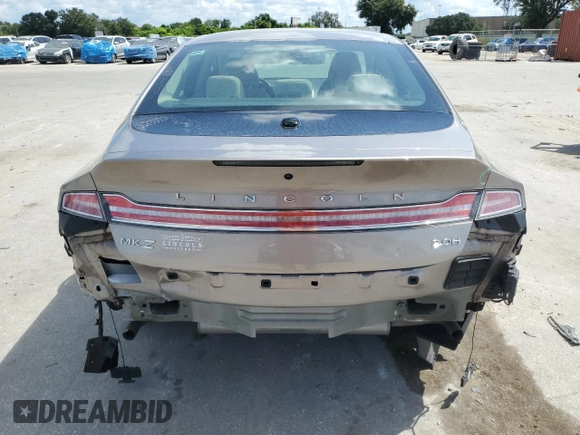 2019 Lincoln MKZ Hybrid z VIN 3LN6L5KU4KR604213, wystawiony jako Copart lot #72761484 z przebiegiem 62 469 mil mil oraz Nie do naprawy • Non repairable. Historia ofert i sprzedaży dostępna na DreamBid. Obrazek 6.