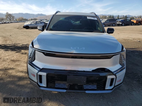 2024 Kia EV9 GT-Line with VIN KNDAEFS53R6021047, listed as a Copart auction lot 84347894 with 7,215 mi miles and Salvage Title. Bid and sale history available at carsss.com. Image 5.