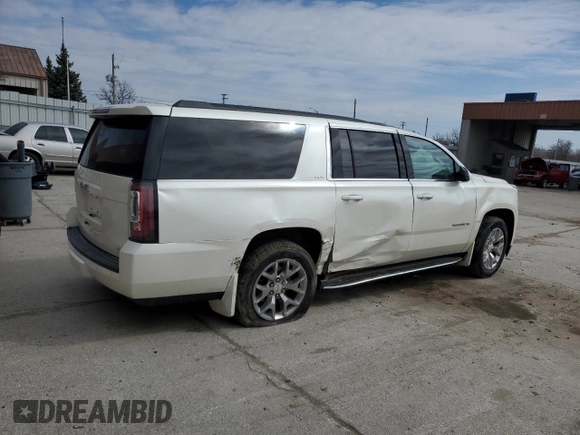 2015 GMC Yukon XL SLT with VIN 1GKS2HKC8FR259966, listed as a Copart auction lot 50410195 with 158,367 mi miles and Salvage Title. Bid and sale history available at carsss.com. Image 3.
