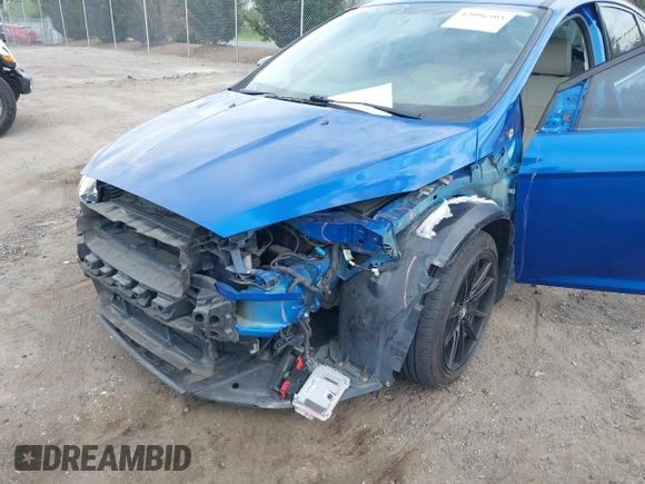 2018 Ford Focus Titanium z VIN 1FADP3N26JL325931, wystawiony jako IAAI lot #42096503 z przebiegiem 106 338 mil mil oraz . Historia ofert i sprzedaży dostępna na DreamBid. Obrazek 6.