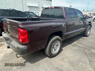2005 Dodge Dakota ST with VIN 1D7HE28N75S204425, listed as a Copart auction lot 55522755 with 122,452 mi miles and Clean Title. Bid and sale history available at carsss.com. Image 4.