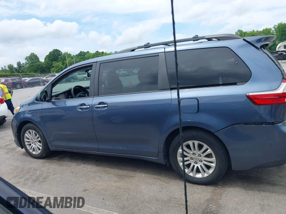 2015 Toyota Sienna XLE with VIN 5TDYK3DC3FS676919, listed as a IAAI auction lot 42475307 with 99,574 mi miles and . Bid and sale history available at DreamBid. Image 14.