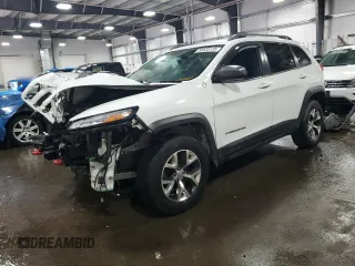 2014 Jeep Cherokee Trailhawk z VIN 1C4PJMBB5EW159957, wystawiony jako Copart lot #58535135 z przebiegiem 188 216 mil mil oraz Szkoda całkowita • Salvage title. Historia ofert i sprzedaży dostępna na DreamBid. Obrazek 1.
