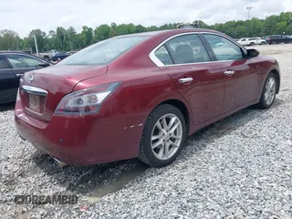 2012 Nissan Maxima SV with VIN 1N4AA5AP3CC860834, listed as a IAAI auction lot 42429509 with 96,939 mi miles and . Bid and sale history available at DreamBid. Image 4.