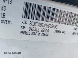 2013 Chrysler 300 with VIN 2C3CCABGXDH699096, listed as a IAAI auction lot 41614034 with 136,344 mi miles. Bid and sale history available at carsss.com. Image 9.
