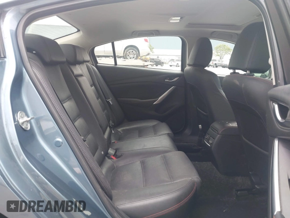 2014 Mazda 6 i Grand Touring with VIN JM1GJ1W64E1133729, listed as a IAAI auction lot 42050222 with 112,464 mi miles and . Bid and sale history available at DreamBid. Image 8.