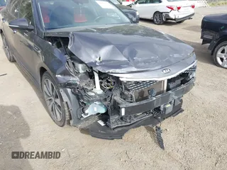 2016 Kia Optima SX Turbo z VIN 5XXGW4L28GG010897, wystawiony jako IAAI lot #42703779 z przebiegiem 121 918 mil mil oraz . Historia ofert i sprzedaży dostępna na DreamBid. Obrazek 6.