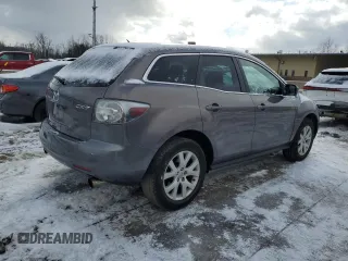 2009 Mazda CX-7 Grand Touring z VIN JM3ER29L990221136, wystawiony jako Copart lot #45233915 z przebiegiem 156 676 mil mil oraz Czysty tytuł • Clean title. Historia ofert i sprzedaży dostępna na DreamBid. Obrazek 3.