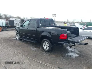 2002 Ford F-150 XLT with VIN 1FTRW08L32KD90202, listed as a IAAI auction lot 41850546 with 256,807 mi miles. Bid and sale history available at carsss.com. Image 3.