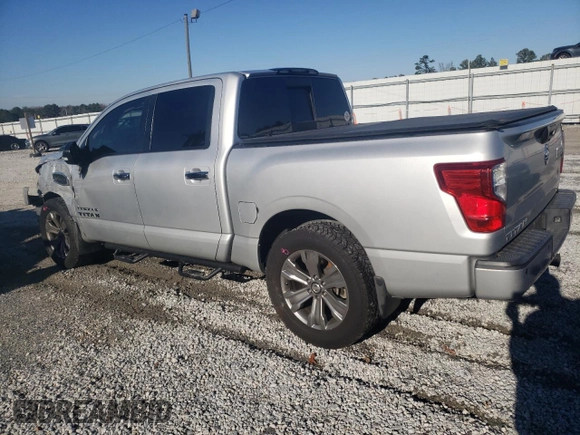 2017 Nissan Titan SL with VIN 1N6AA1E6XHN527639, listed as a Copart auction lot 85644444 with 165,243 mi miles and Salvage title. Bid and sale history available at DreamBid. Image 2.