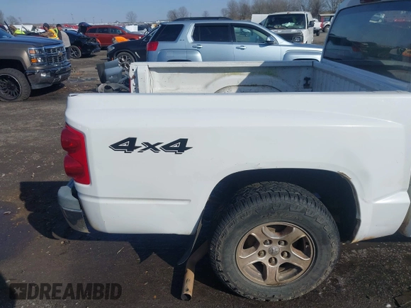 2005 Dodge Dakota SLT with VIN 1D7HW48N85S226460, listed as a IAAI auction lot 41568128 with 213,159 mi miles and . Bid and sale history available at carsss.com. Image 21.
