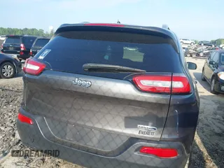 2014 Jeep Cherokee Latitude with VIN 1C4PJLCB6EW241897, listed as a IAAI auction lot 42128880 with 126,242 mi miles. Bid and sale history available at carsss.com. Image 16.