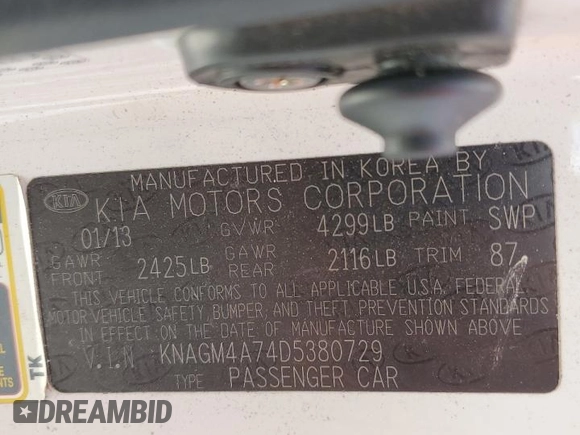 2013 Kia Optima LX z VIN KNAGM4A74D5380729, wystawiony jako Copart lot #56555835 z przebiegiem 126 904 mil mil oraz Szkoda całkowita • Salvage title. Historia ofert i sprzedaży dostępna na DreamBid. Obrazek 13.