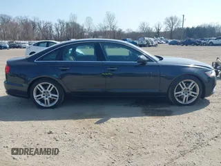 2015 Audi A6 Premium Plus z VIN WAUGFAFC8FN044809, wystawiony jako IAAI lot #41810102 z przebiegiem 153 577 mil mil oraz . Historia ofert i sprzedaży dostępna na DreamBid. Obrazek 13.
