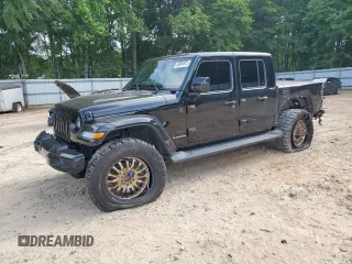 2021 Jeep Gladiator Overland с VIN 1C6HJTFGXML570864, выставлен на аукционе Copart как лот 56964975 с пробегом 67 538 миль миль и Списание • Salvage title. История ставок и продаж доступна на DreamBid. Изображение 1.