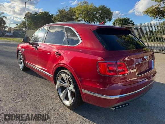 2017 Bentley Bentayga W12 z VIN SJAAC2ZV1HC014037, wystawiony jako Copart lot #54799655 z przebiegiem 36 099 mil mil oraz Szkody całkowita. Historia ofert i sprzedaży dostępna na DreamBid. Obrazek 2.