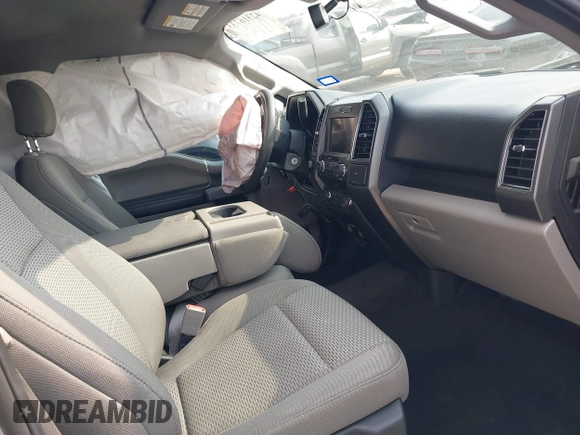 2020 Ford F-150 XL with VIN 1FTEW1E54LKE24160, listed as a IAAI auction lot 42316733 with 83,215 mi miles and . Bid and sale history available at DreamBid. Image 5.