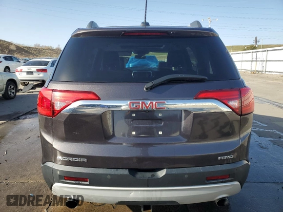 2018 GMC Acadia SLT z VIN 1GKKNULSXJZ192527, wystawiony jako Copart lot #52335155 z przebiegiem Nie podano mil oraz Szkoda całkowita • Salvage title. Historia ofert i sprzedaży dostępna na DreamBid. Obrazek 6.
