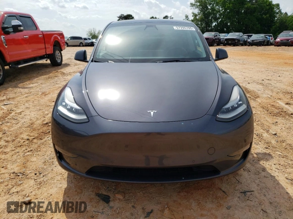 2021 Tesla Model Y Long Range z VIN 5YJYGDEE0MF263137, wystawiony jako Copart lot #57295705 z przebiegiem 63 627 mil mil oraz Szkoda całkowita • Salvage title. Historia ofert i sprzedaży dostępna na DreamBid. Obrazek 5.