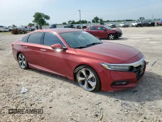 2018 Honda Accord Touring z VIN 1HGCV1F94JA030870, wystawiony jako Copart lot #56889535 z przebiegiem 105 226 mil mil oraz Szkoda całkowita • Salvage title. Historia ofert i sprzedaży dostępna na DreamBid. Obrazek 4.