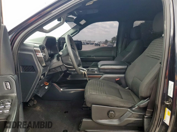 2023 Ford F-150 XL with VIN 1FTEW1CP8PKF56672, listed as a Copart auction lot 56911865 with 34,124 mi miles and Non repairable. Bid and sale history available at DreamBid. Image 7.