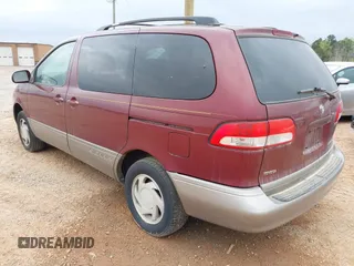 2002 Toyota Sienna LE with VIN 4T3ZF13C12U437425, listed as a IAAI auction lot 41157987 with 200,309 mi miles. Bid and sale history available at carsss.com. Image 3.