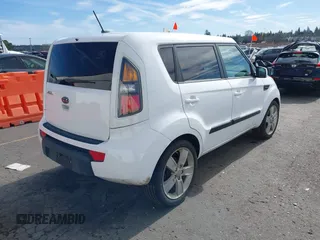 2011 Kia Soul + with VIN KNDJT2A23B7267442, listed as a IAAI auction lot 41671119 with 123,577 mi miles. Bid and sale history available at carsss.com. Image 4.