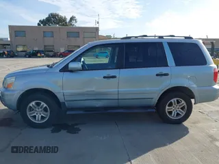 2003 Honda Pilot EX with VIN 2HKYF18463H543326, listed as a IAAI auction lot 41837876 with 215,263 mi miles. Bid and sale history available at carsss.com. Image 14.