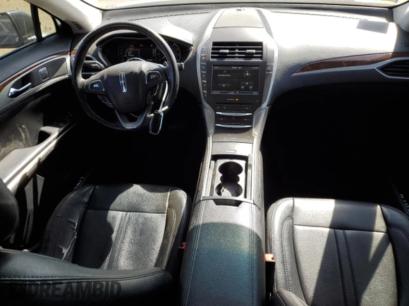 2015 Lincoln MKZ z VIN 3LN6L2GK1FR613074, wystawiony jako Copart lot #52157775 z przebiegiem 118 144 mil mil oraz Szkoda całkowita • Salvage title. Historia ofert i sprzedaży dostępna na DreamBid. Obrazek 8.