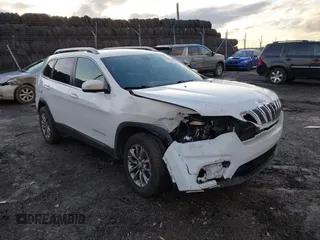 2019 Jeep Cherokee Latitude Plus with VIN 1C4PJMLX2KD254946, listed as a IAAI auction lot 41581777 with 49,748 mi miles. Bid and sale history available at carsss.com. Image 1.