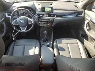 2018 BMW X1 sDrive28i with VIN WBXHU7C35J5L09783, listed as a Copart auction lot 55147935 with 37,114 mi miles and Salvage Title. Bid and sale history available at DreamBid. Image 8.