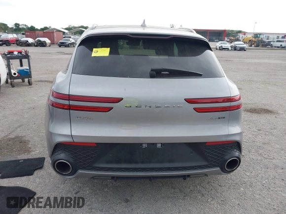 2023 Genesis GV70 Sport with VIN KMUMCDTC1PU098851, listed as a IAAI auction lot 41864774 with 15,016 mi miles and . Bid and sale history available at DreamBid. Image 16.