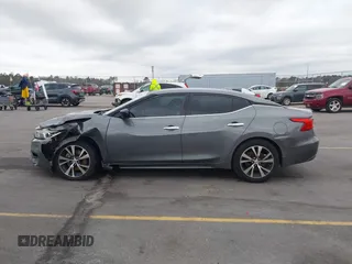 2018 Nissan Maxima SV with VIN 1N4AA6APXJC400203, listed as a IAAI auction lot 41617771 with 107,366 mi miles and . Bid and sale history available at DreamBid. Image 14.
