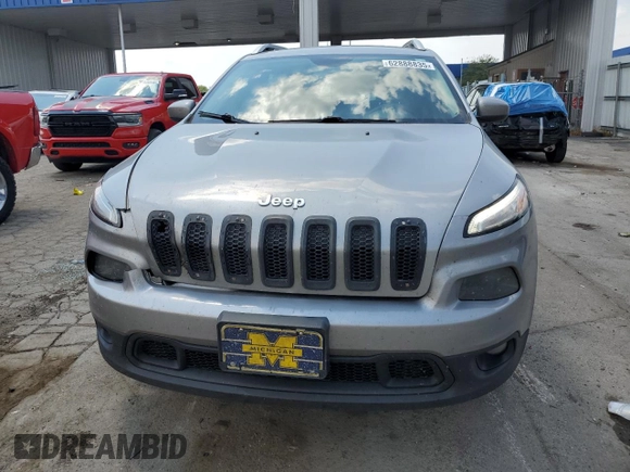 2015 Jeep Cherokee Latitude with VIN 1C4PJMCB6FW644818, listed as a Copart auction lot 62888835 with 262,063 mi miles and Salvage title. Bid and sale history available at DreamBid. Image 5.