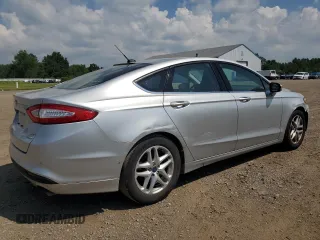 2016 Ford Fusion SE z VIN 3FA6P0HD0GR401822, wystawiony jako Copart lot #64350035 z przebiegiem 145 166 mil mil oraz Czysty tytuł • Clean title. Historia ofert i sprzedaży dostępna na DreamBid. Obrazek 3.