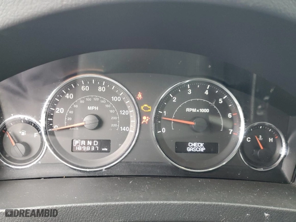 2009 Jeep Grand Cherokee Laredo with VIN 1J8GR48K69C553631, listed as a Copart auction lot 51572875 with 189,837 mi miles and Salvage Title. Bid and sale history available at carsss.com. Image 9.