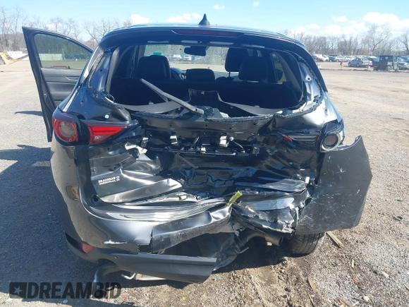 2020 Mazda CX-5 Grand Touring with VIN JM3KFBDM1L0821975, listed as a IAAI auction lot 40088794 with 68,895 mi miles and . Bid and sale history available at DreamBid. Image 6.