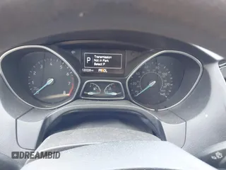 2016 Ford Focus SE z VIN 1FADP3F28GL213252, wystawiony jako IAAI lot #42660857 z przebiegiem 120 226 mil mil oraz . Historia ofert i sprzedaży dostępna na DreamBid. Obrazek 7.