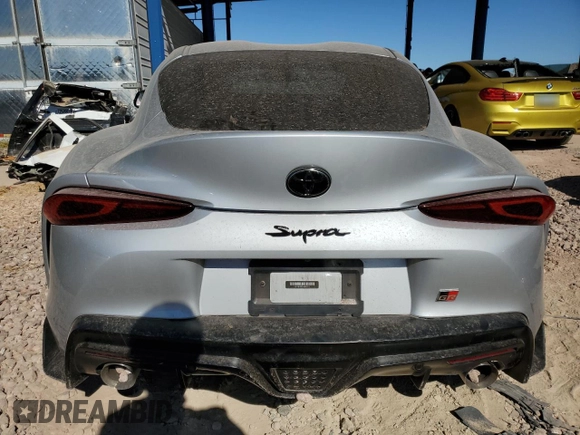 2021 Toyota GR Supra 3.0 with VIN WZ1DB0C02MW041211, listed as a Copart auction lot 79557064 with 0 mi miles and Salvage Title. Bid and sale history available at carsss.com. Image 6.