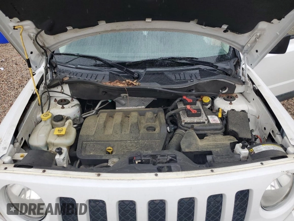 2011 Jeep Patriot Sport z VIN 1J4NT1GBXBD289100, wystawiony jako Copart lot #58624415 z przebiegiem 119 710 mil mil oraz Czysty tytuł • Clean title. Historia ofert i sprzedaży dostępna na DreamBid. Obrazek 11.